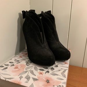 Black booties by GUESS